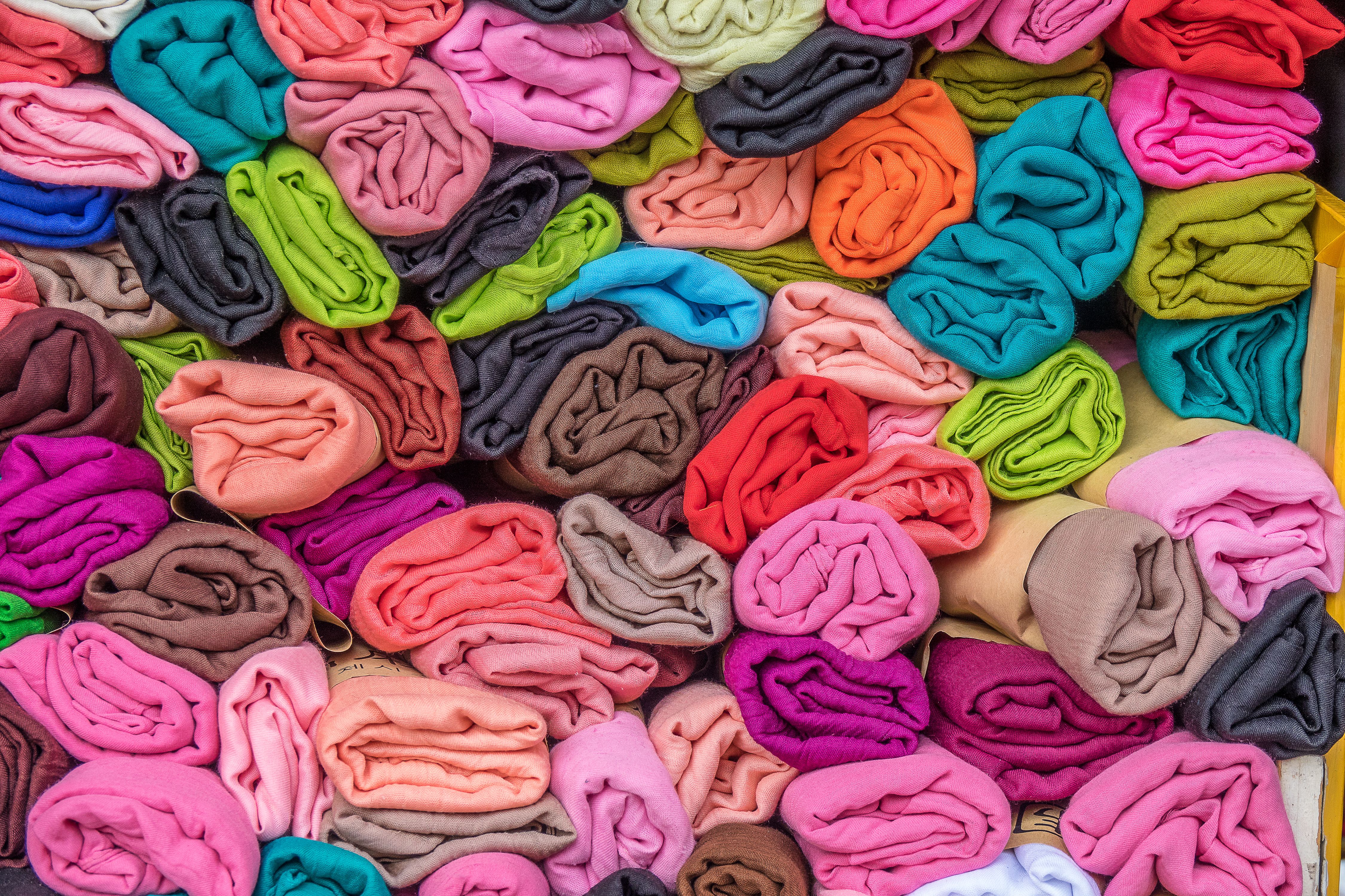 Close up of hands using a sewing machine