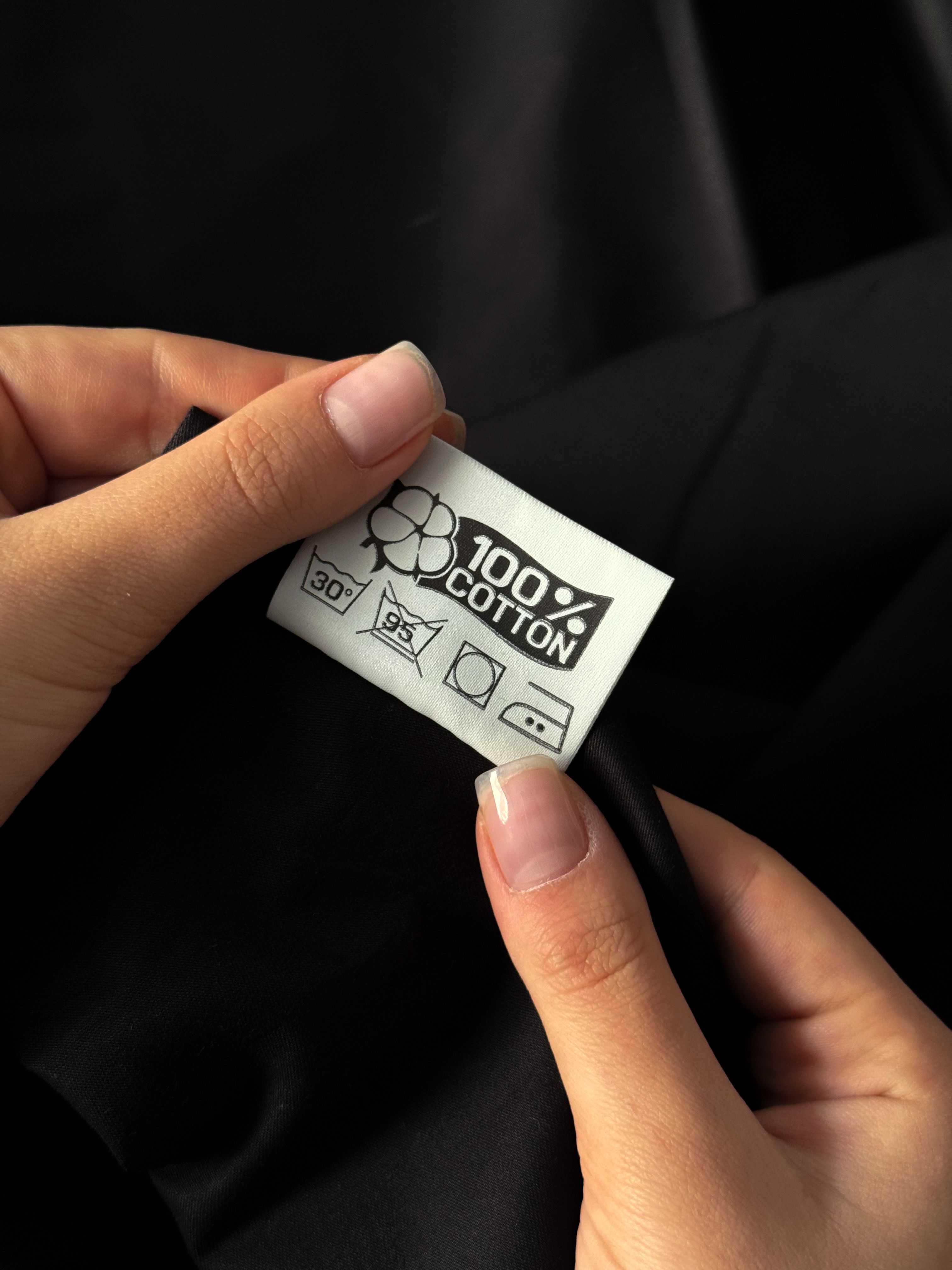 100% Cotton care label close up