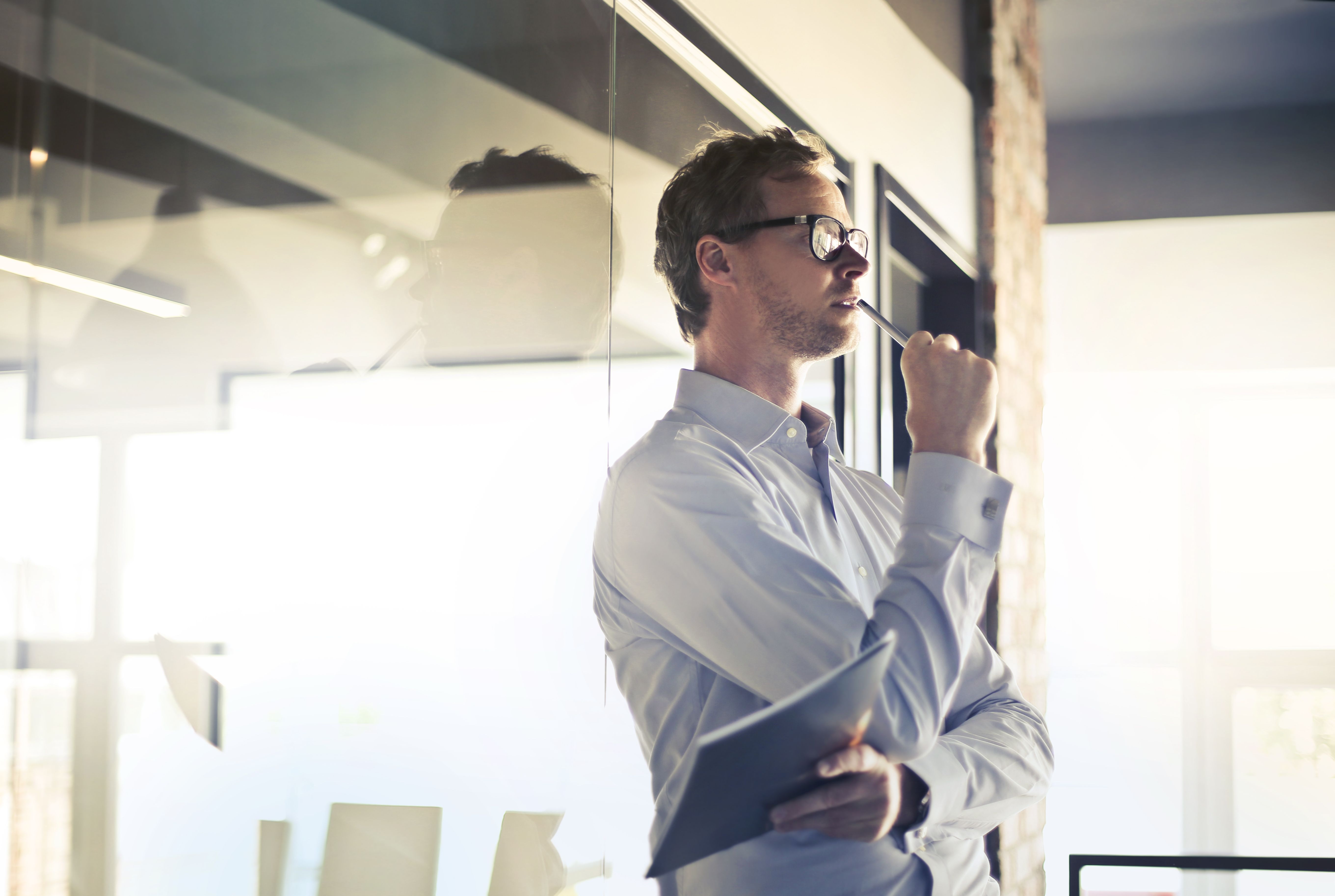 Person thinking over options and customer inquiries