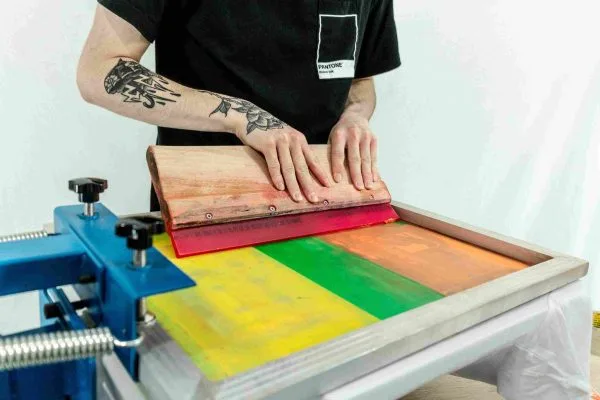 Close up of hands using a sewing machine